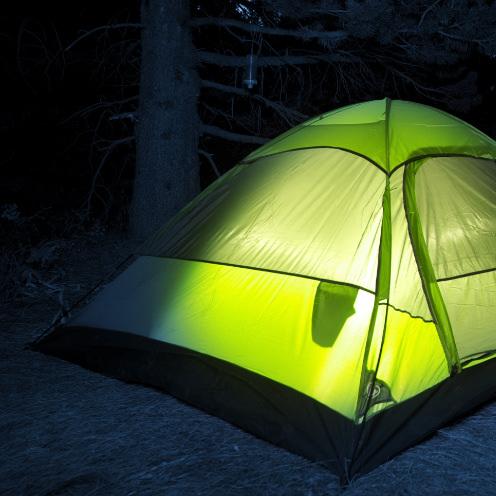 Camp tent with glowing light inside